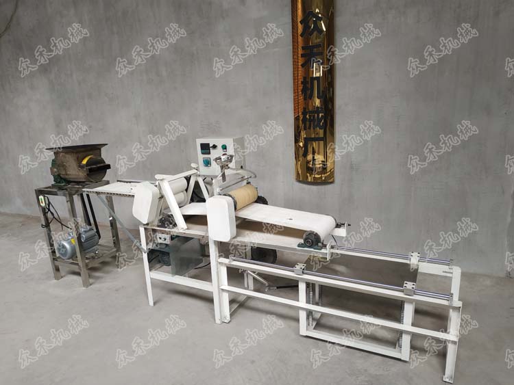 數(shù)控仿手工搟面皮成型機價格多少錢